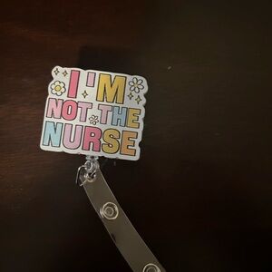 I'm Not The Nurse Badge Reel - Pastel Pink Blue Yellow